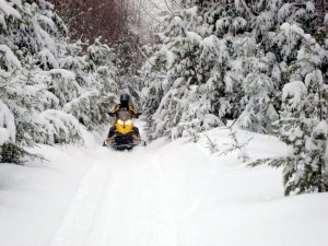 Trail to Rainbow Lake snowmobiling near Millinocket, Maine - photo: Richard Levasseur